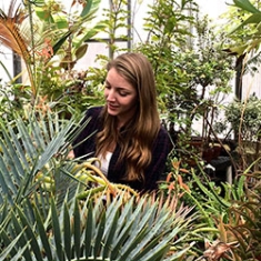 Student in greenhouse